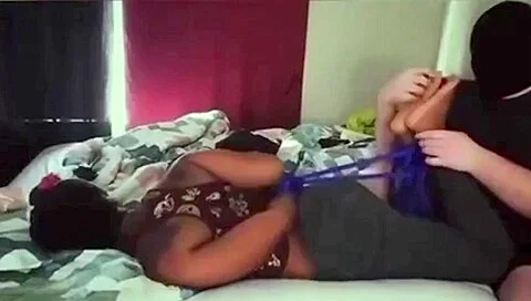 Masked Ebony In Hogtie Tickle