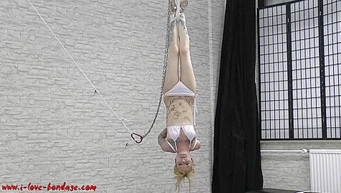 Girl Hangs Upside Down