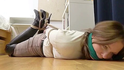 Brunette Hogtied In Leather Boots