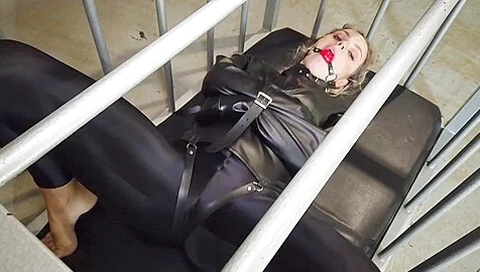 Straitjacket In The Cage