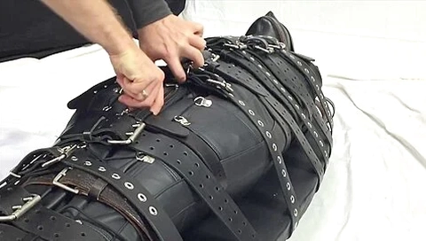 Restrained With 20 Belts In Heavy Leather
