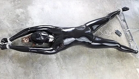 Rubber-bound Girl In Electro Play